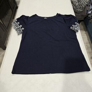Navy Women's Top with White Floral Sleeves